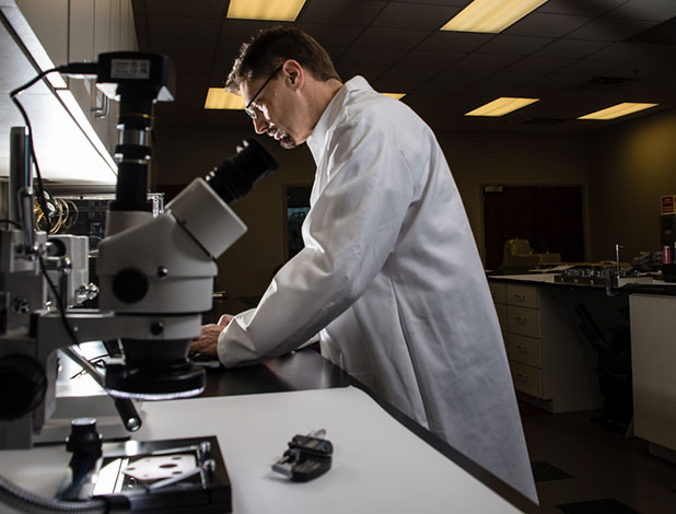 HGC employee evaluating a gasket